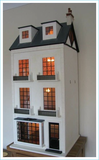 Ash Mews painted suggestion and lit up 1/12th scale dollshouse